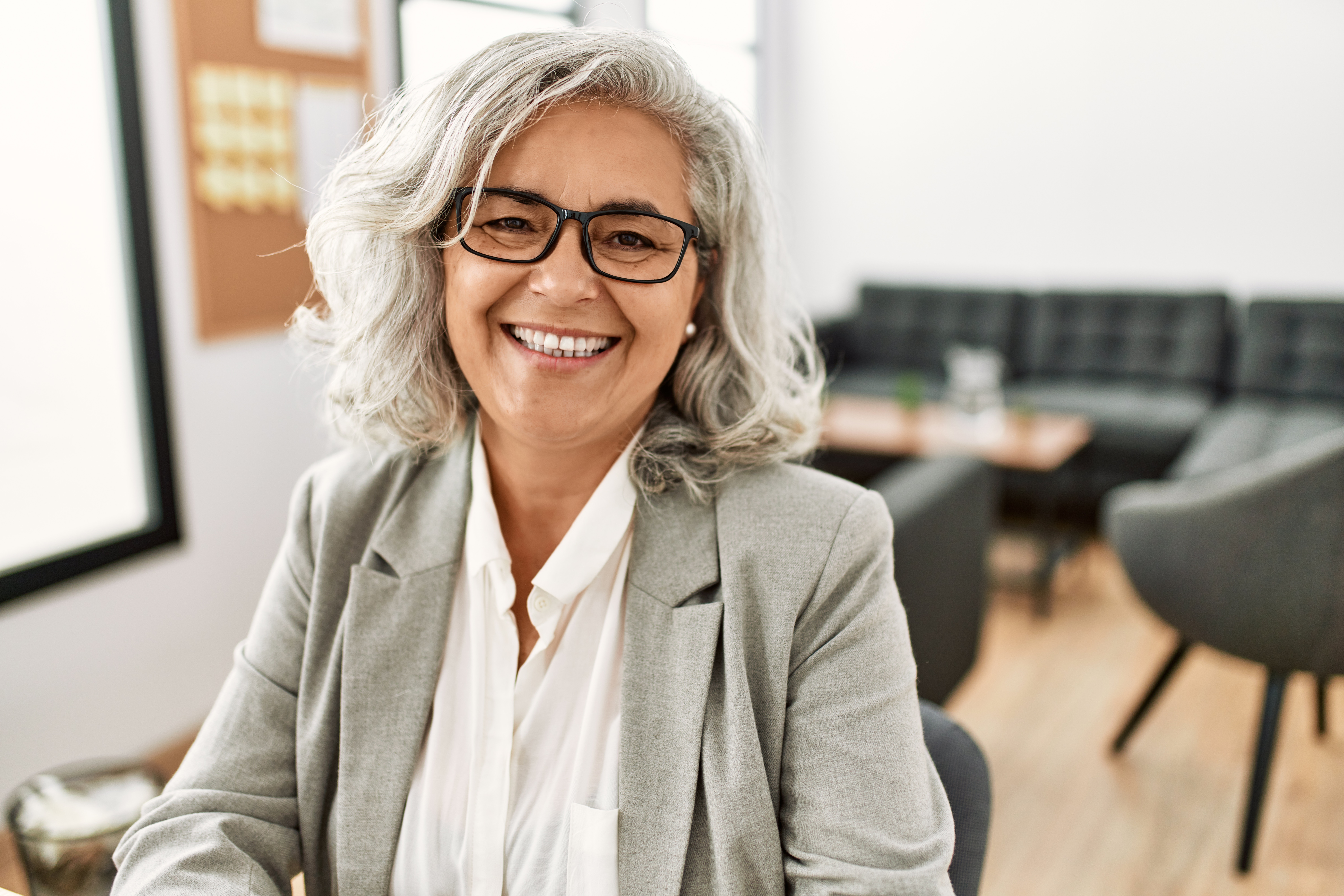 An older woman smiling.