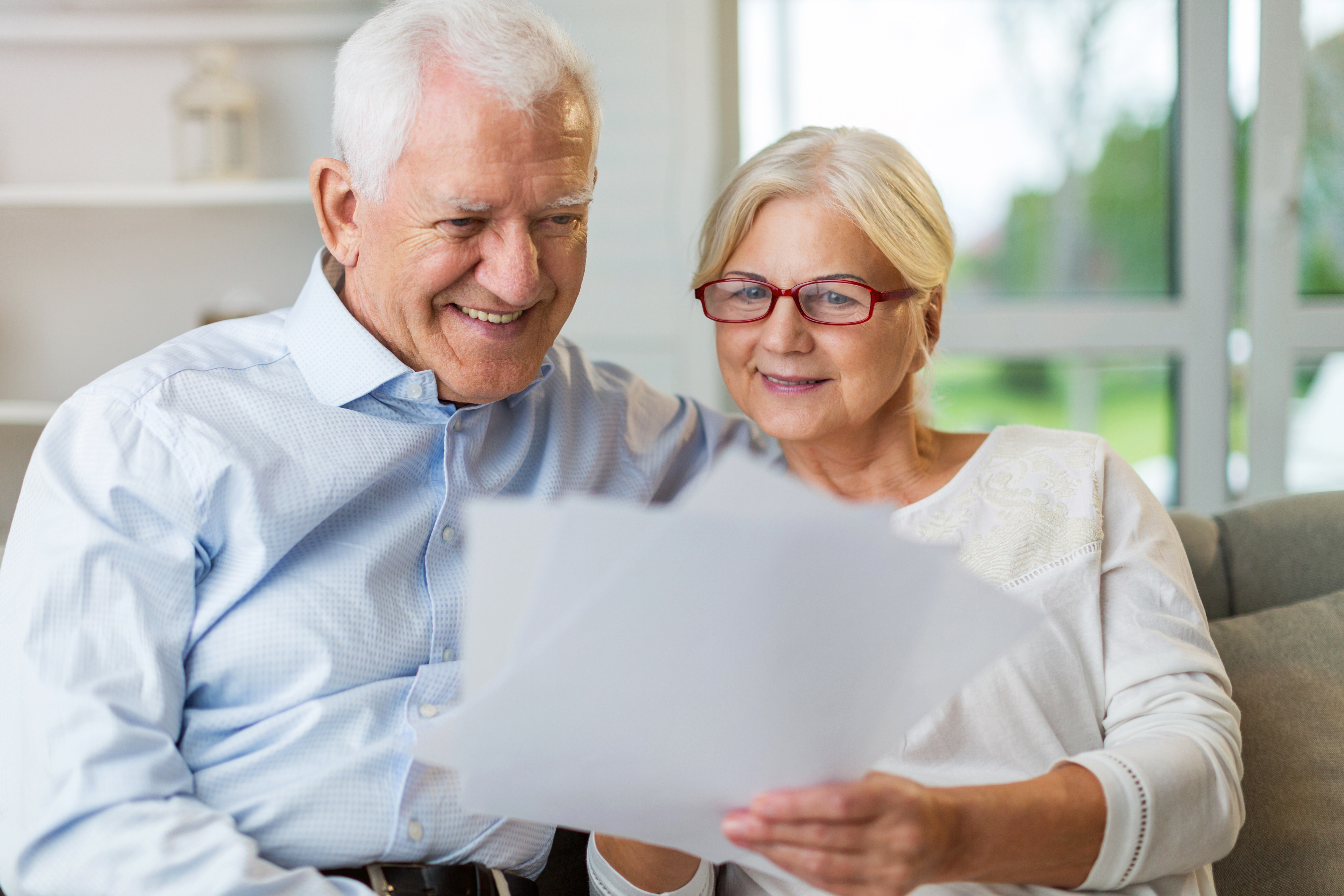 An older couple going over documents.