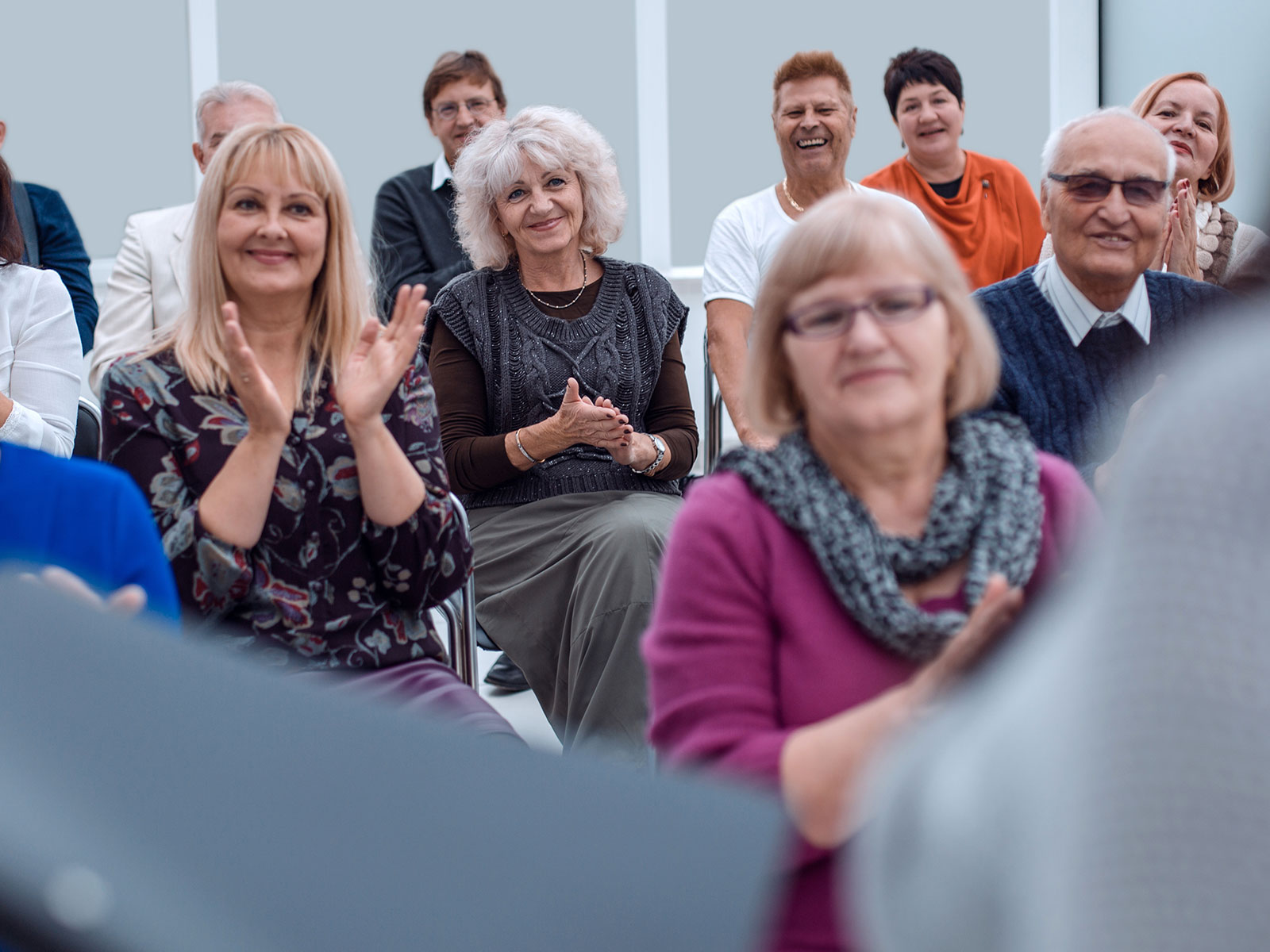 A group of people at a seminar.