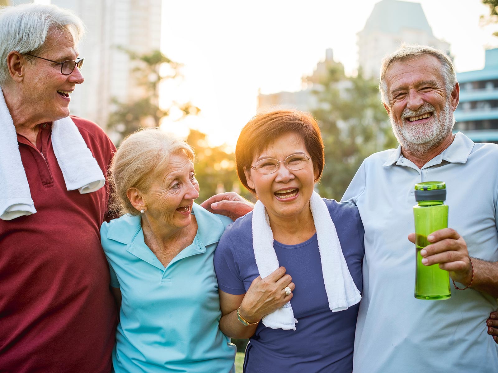 Group of older people laughing and smiling.